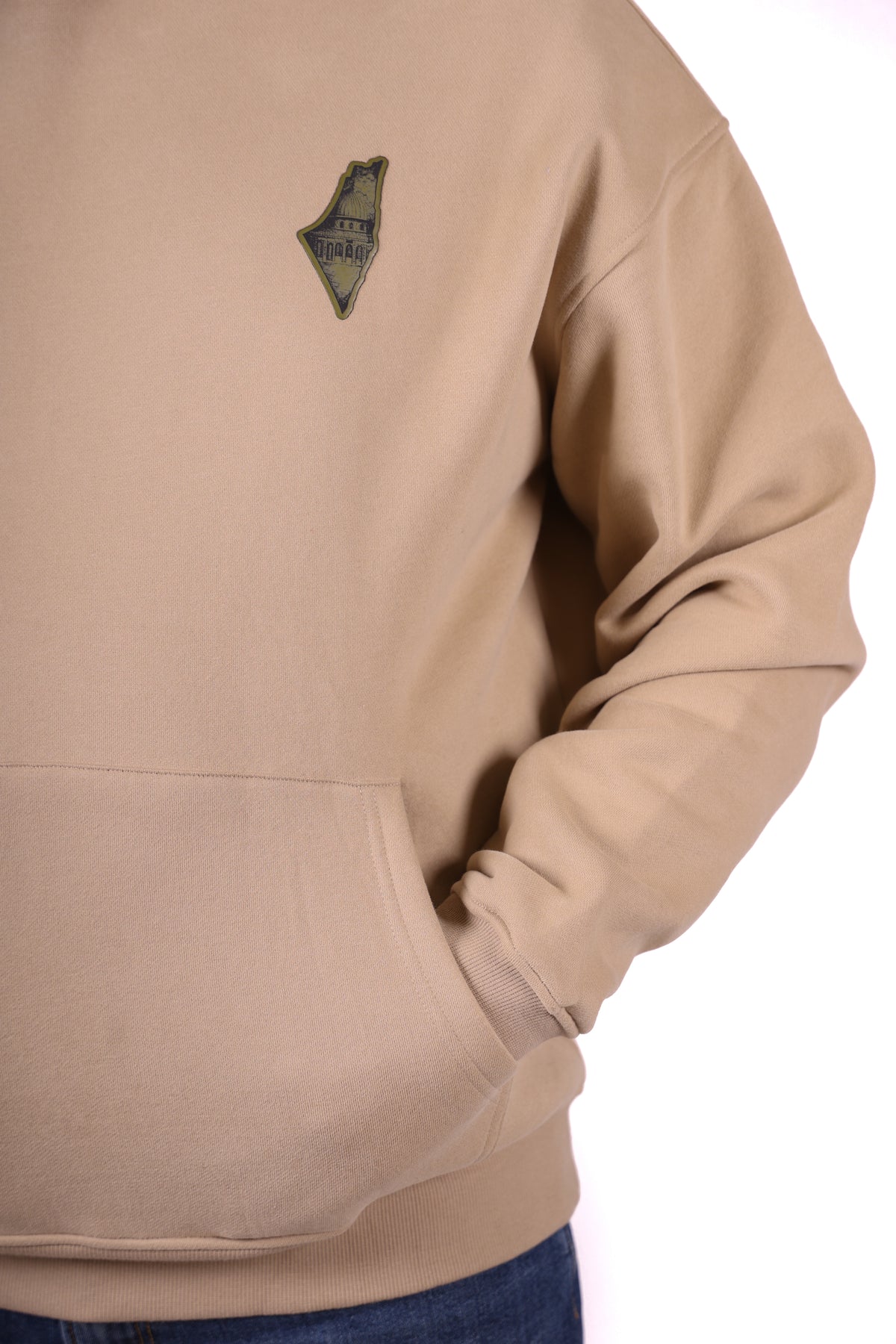 Beige sweatshirt with a logo on the chest against a white background