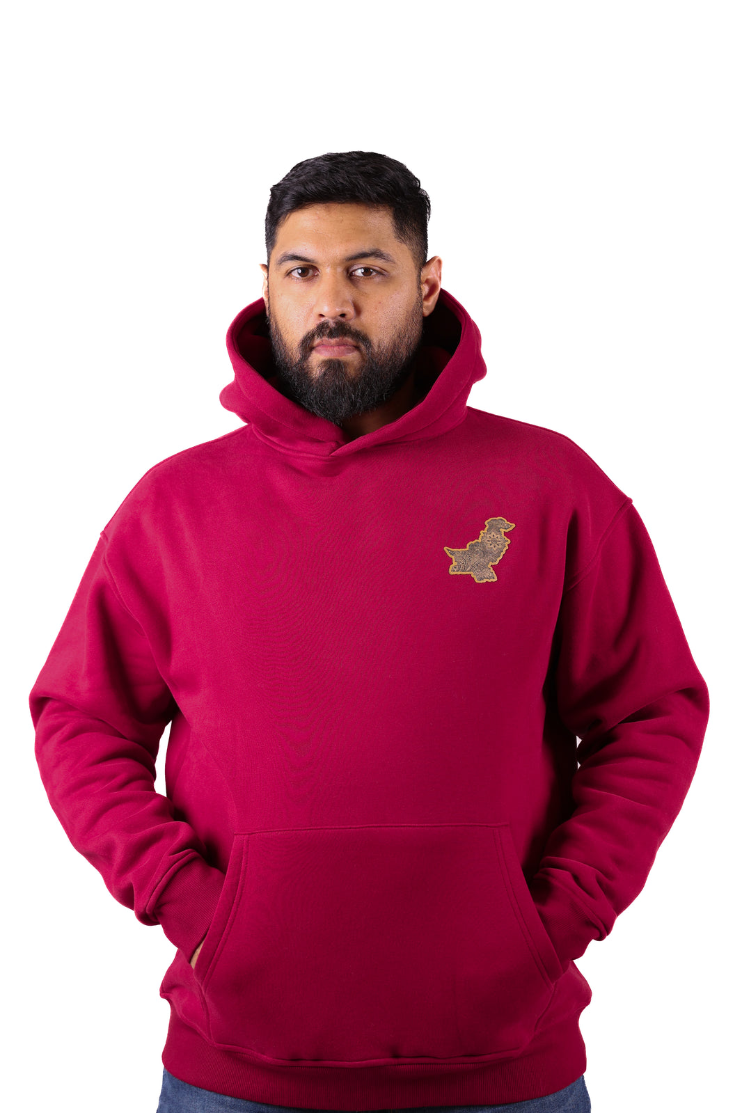 Man wearing a red hoodie with a small logo on a white background